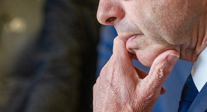 Human chin close-up highlighting facial anatomy and evolutionary significance theories