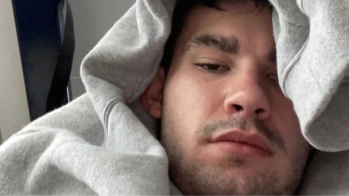 Manic episode scene, person expressing grandiose delusions and seeking recognition in madness