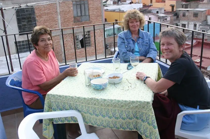 Louisa Rogers (right) with her Guanajuato city neighbors on their terrace: