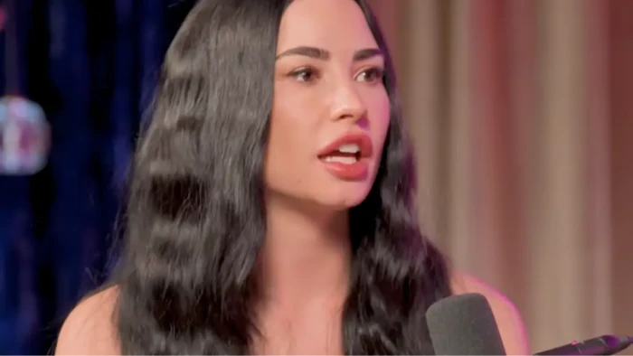 Demi Lovato and Keke Palmer embracing, discussing growth and maturity.