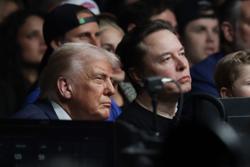 President Donald Trump watches the Ultimate Fighting Championship with Elon Musk at the Kaseya Center on April 12, 2025, in Miami
