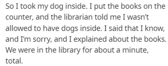 OP took their dog inside and the librarian told them that dogs aren't allowed