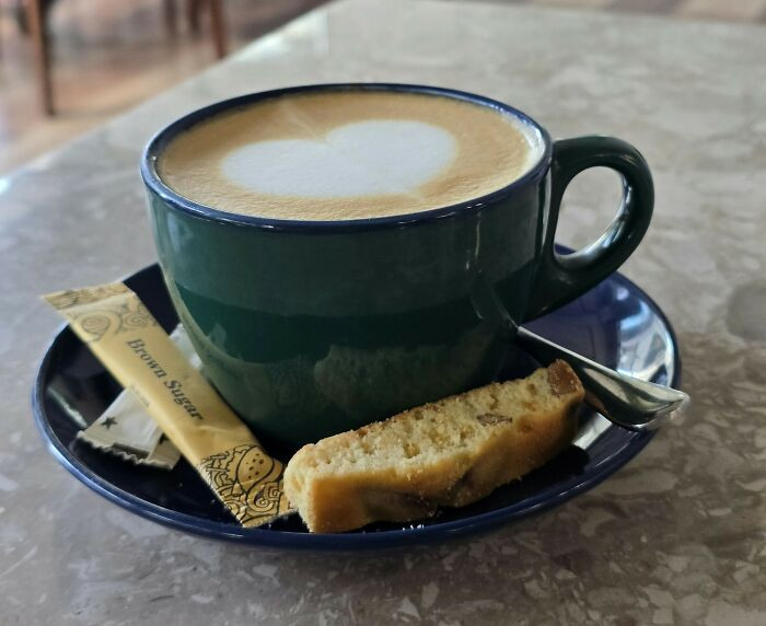 "Tore open a sugar packet, poured it directly into the trash, tossed the empty paper packet into my coffee."