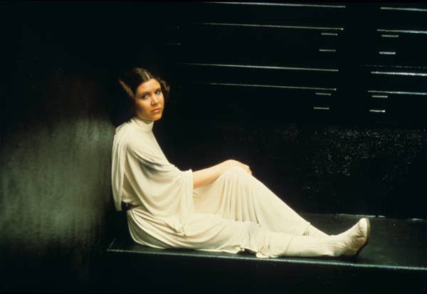 Carrie Fisher became an iconic figure in 1977 when she took on the role of Princess Leia in Star Wars: Episode IV - A New Hope, marking the start of her journey into cinematic history.