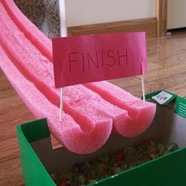 32. Cut a pool noodle in half to make a marble race track