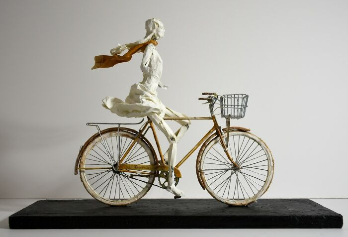 Artwork titled The Fall, thin sheet sculpture with layered folds and haunting contours