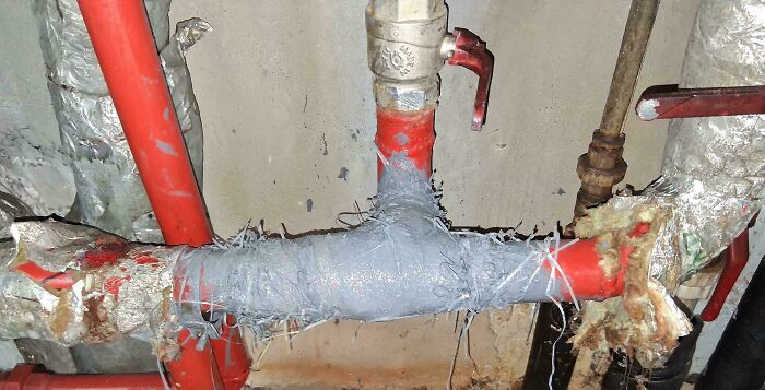 "Slow Leak On Water Pipe, No Plumber Available Today - 10 Layers Of Paint And 2 Burlap Bags Cut In Strips"