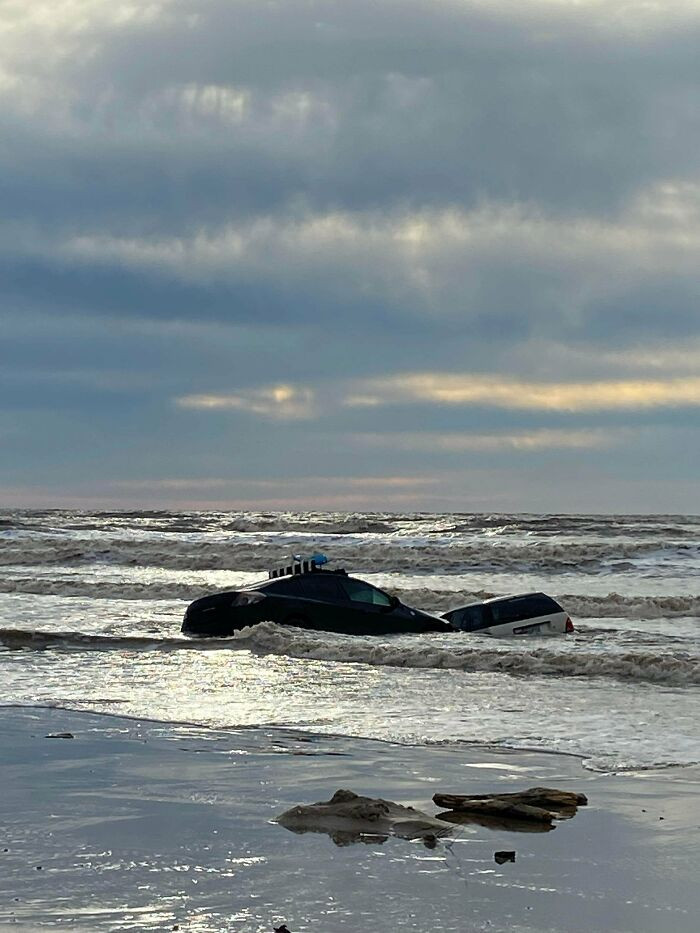 "Parking On The Beach During Low Tide"