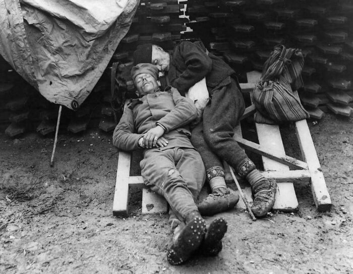 A Serbian Soldier Sleeps With His Father Who Came To Visit Him On The Front Line Near Belgrade, Serbia, 1914