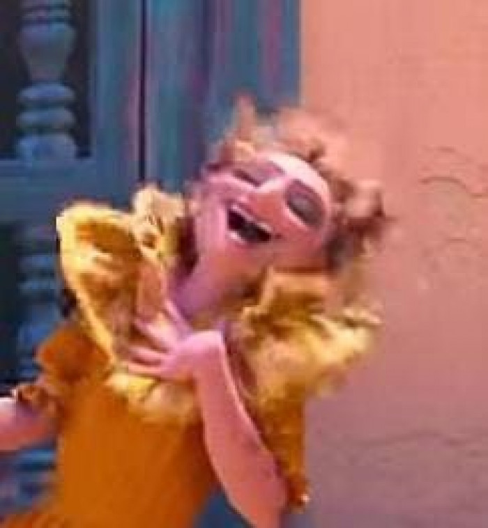 1. Is it me, or is she missing a tooth?