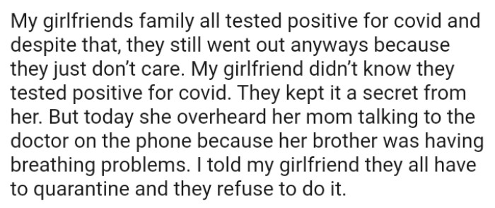 The OP's girlfriend didn’t know her family tested positive for Covid, and they all kept it a secret from her