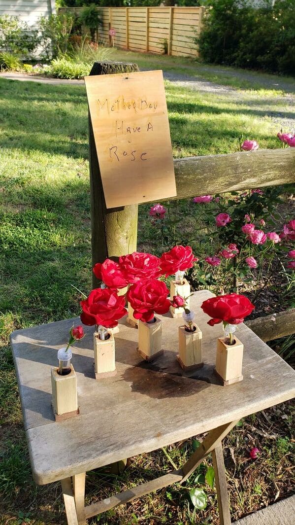 5. “90-Year-Old Neighbor On Strict Quarantine Put Out A Table Of Roses From His Garden In Wood Vases He Made By Hand”