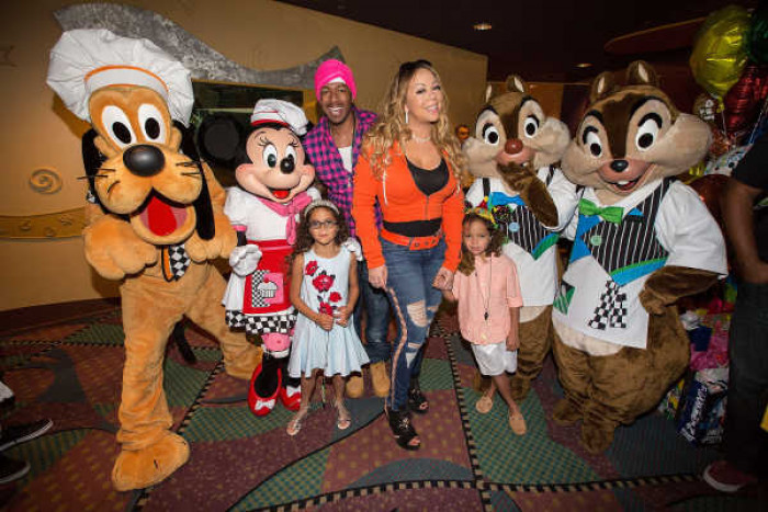 2. Mariah Carey and her twins, Moroccan and Monroe, are clearly big Disney fans