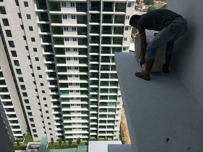 12. Fixing An AC Compressor On A Level 28 Ledge