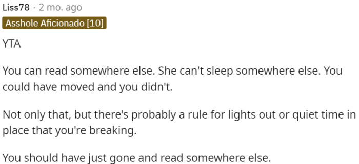 OP should have found an alternative location to read to accommodate her roommate's needs.