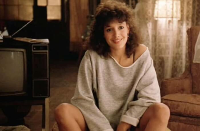 4. Torn, Off-the-Shoulder Sweatshirts Became Popular After ‘Flashdance’