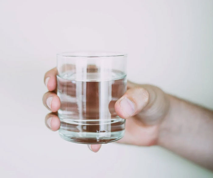 8. Accept the glass of water to allow yourself time to think of an answer.