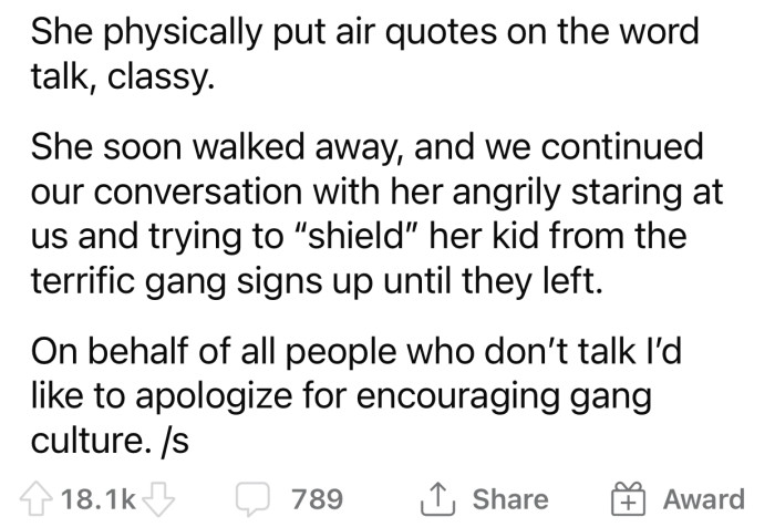 The woman tried to shield her kid from Op's 'gang signs' the whole time.