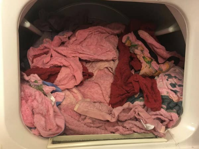 11. This husband needs to learn that reds should not be washed with light colors: