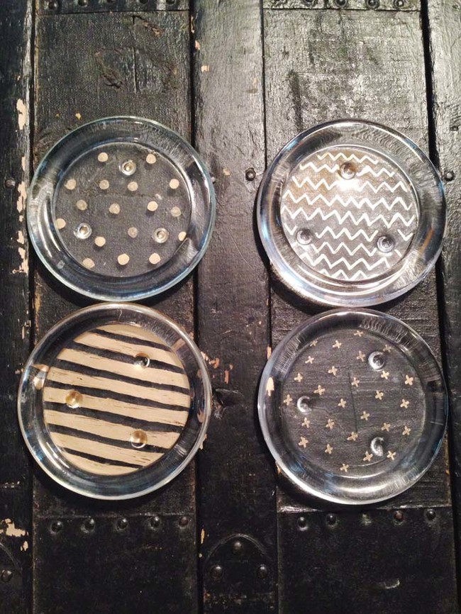 1. Transform outdated ashtrays into stylish coasters with metallic paint pens, leaving littered thrift store shelves behind.