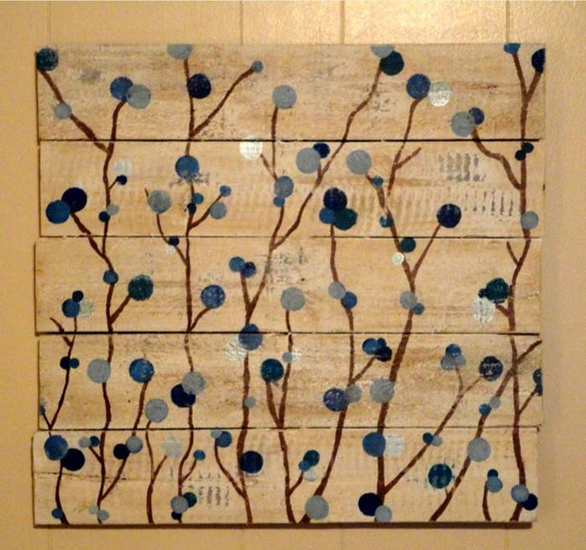 17. Utilize wooden slats bonded together to serve as a canvas for artistic creations.