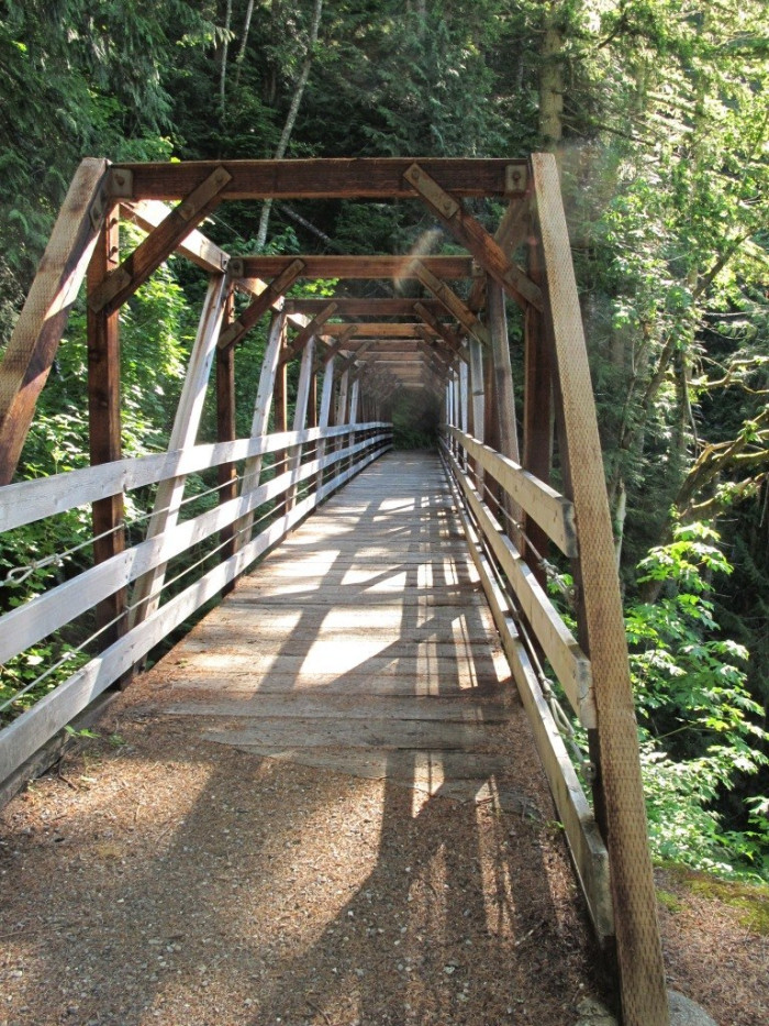 Wellington / Iron Goat Trail (Stevens Pass): in March 1910, an avalanche swept two trains off the tracks here and killed 96 people, the deadliest avalanche in American history, and hikers on the old grade still report voices in the snow.