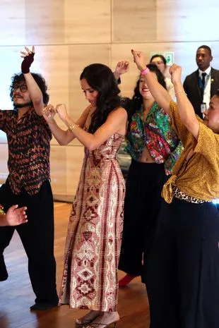 Meghan grooves to Colombian beats, winning hearts one step at a time