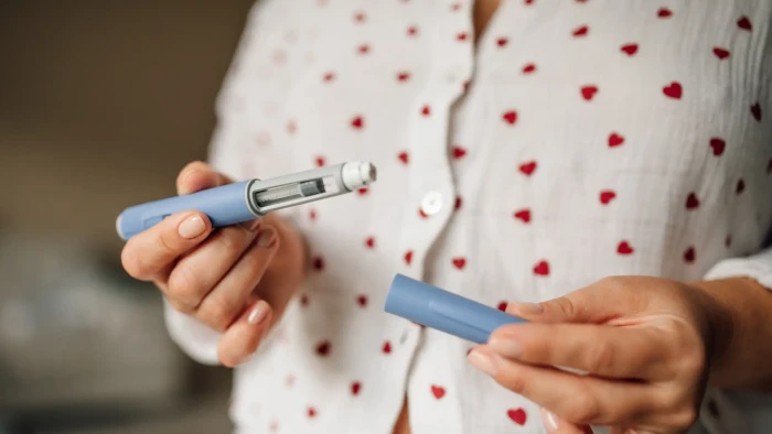 Person tracking appetite and meal timing while using GLP-1 weight loss medication