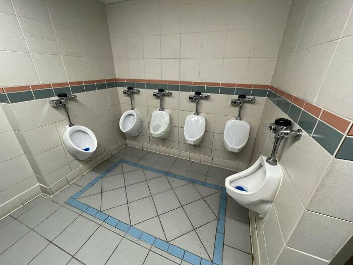 30. A restroom in a dilapidated theater.