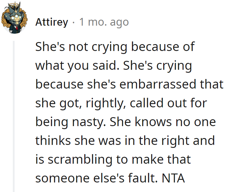 She's crying from embarrassment, not from the words said. NTA; she's just shifting blame.