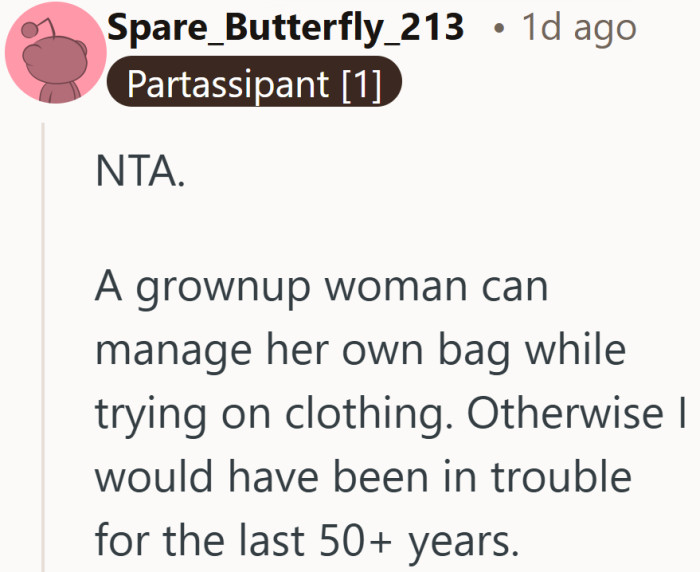 Apparently managing a tote while trying on clothes is not the impossible task some moments make it sound like.