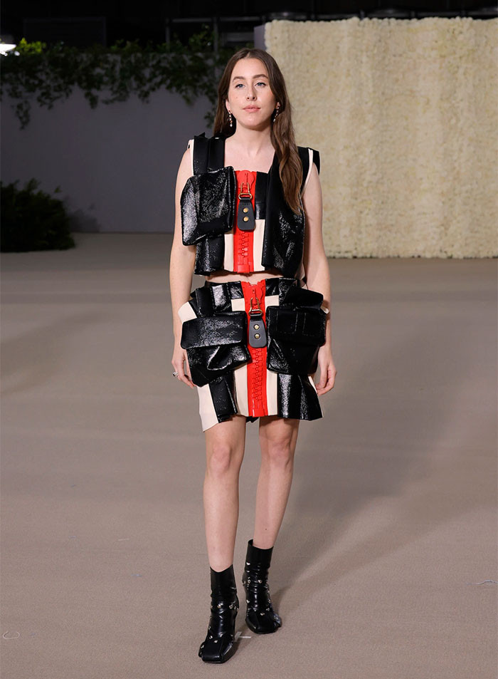 10. Somebody Needs To Do A Wellness Check On Louis Vuitton. They Seem To Have Seriously Gone Off The Rails! The Current Collection Swings From BDSM To Girly, Frilly Baby Doll Dresses.