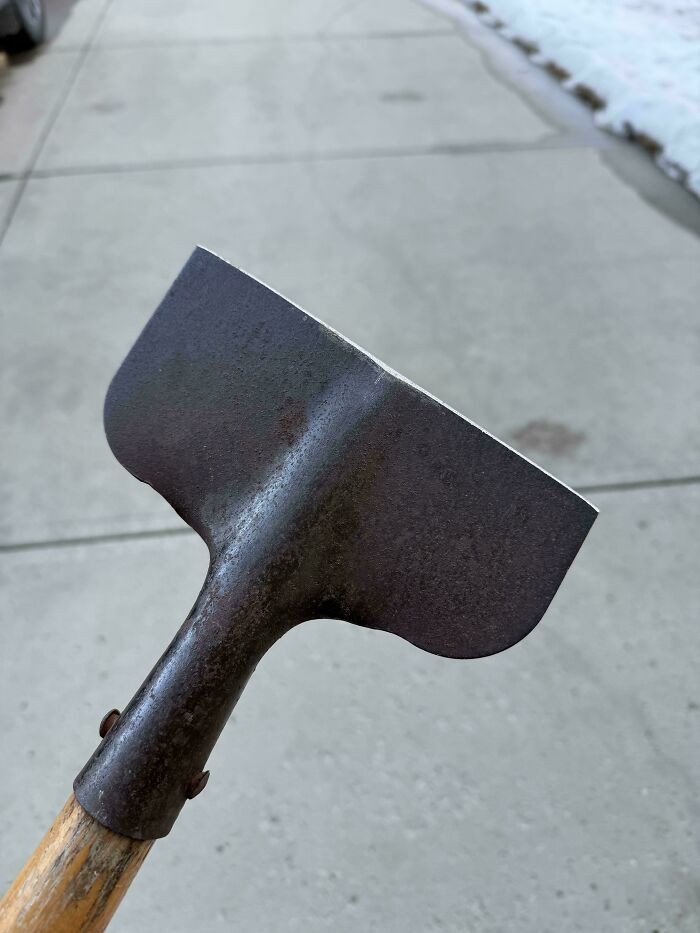 "My Old Ice Scraper, Worn From Years Of Use"