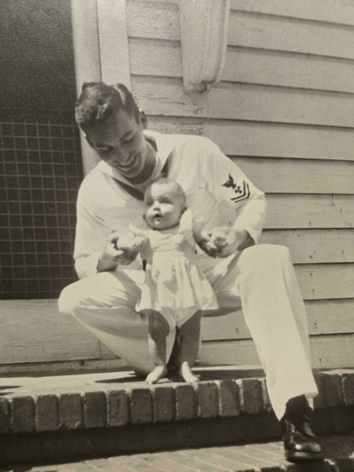 "My Grandpa Holding My Mom, Early 1944"