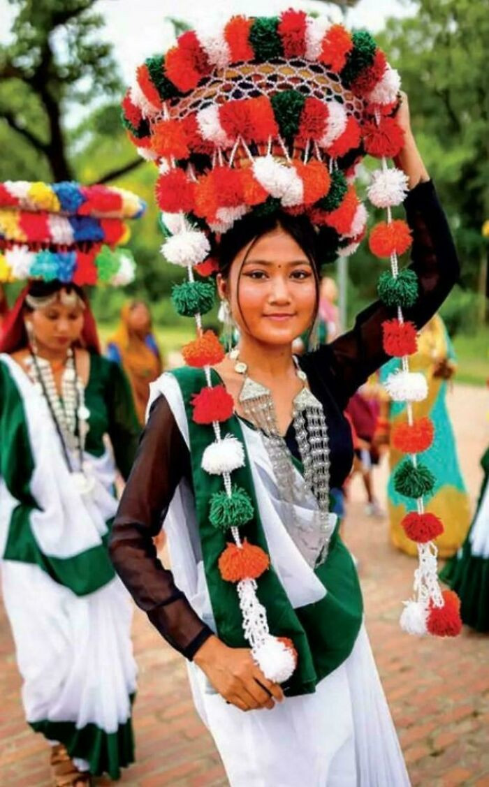 A Young Woman From The Tharu Community, A Mostly Hindu Group In Southern Nepal And Northern India, Parades With Others In Honour Of Buddha's Birthday