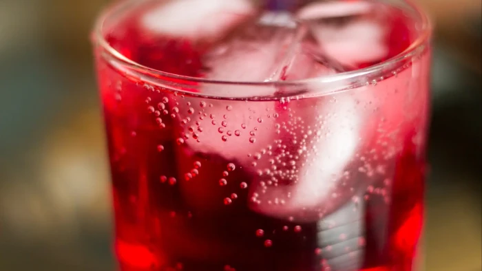 Close-up of restaurant beverage bottles, concerned parents and food safety context