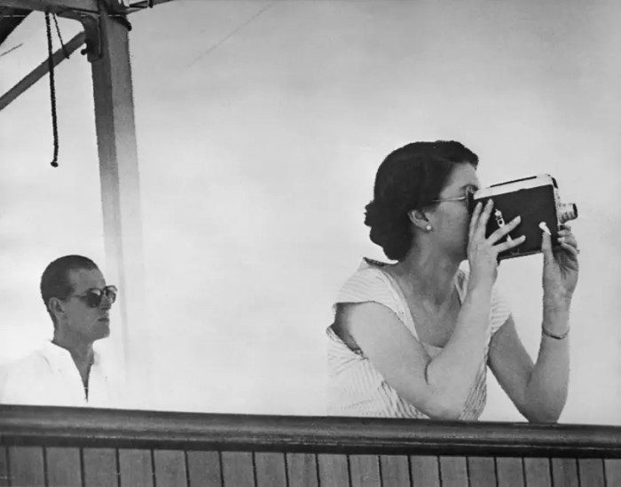 15. Using a video camera aboard the SS Gothic during the coronation world tour