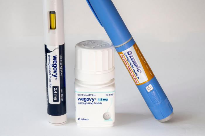Medical warning signs and semaglutide label, highlighting dangers of counterfeit purchases