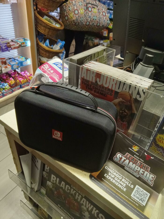 "Someone Forgot Their Switch At The Train Station News Stand"