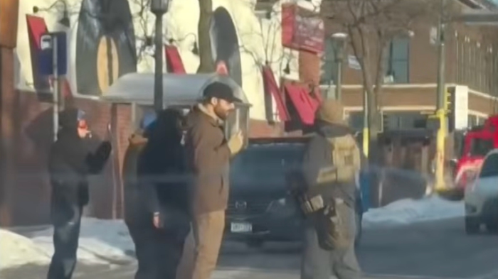 Minneapolis scene with police in riot gear, pepper spray and gunfire aftermath
