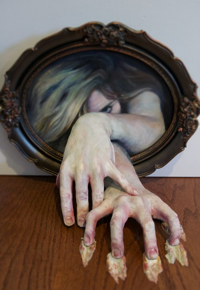 "Epoxy sculpture and oil on panel."