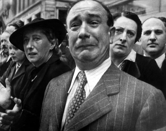 A French man breaks down in tears as German troops enter Paris, marking the moment the capital falls after Allied forces are pushed back across France in 1940.