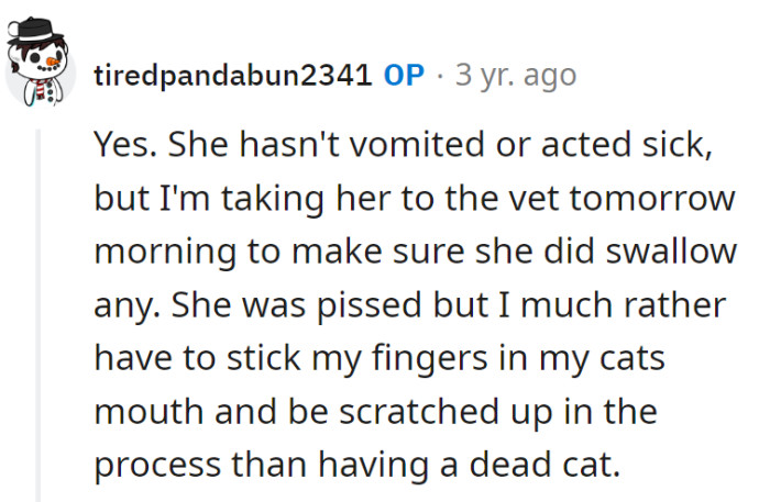 Scratched fingers: the battle scars for a live, grumpy cat beat a 'rest in peace' situation any day!
