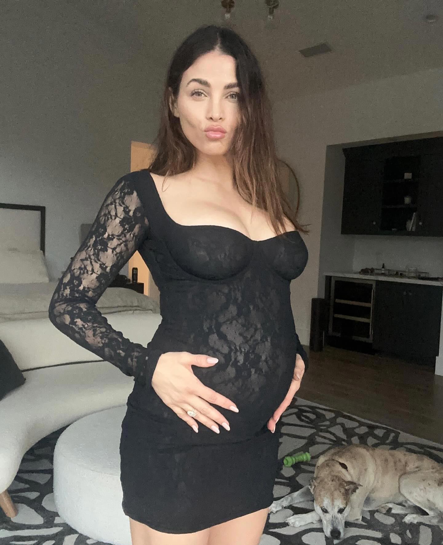 Fashion alert! Jenna's bump made headlines in a jaw-dropping black lace dress