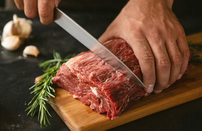 19. Buying meat in bulk and breaking it down into smaller packages at home