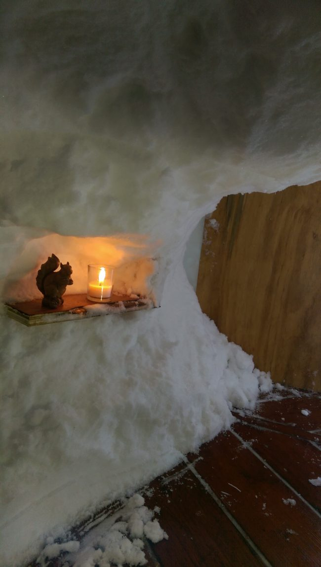 What a fitting detail—a hand-carved statue of a squirrel.