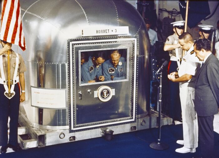 "Astronauts In Prayer Within Quarantine Facility"