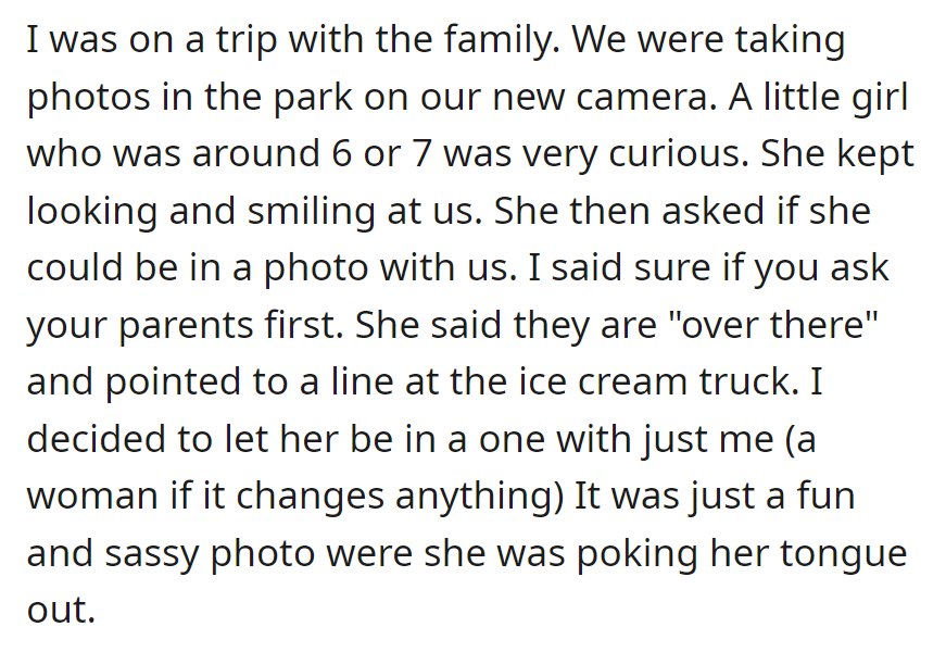 During a park visit, a girl joined their photo while her parents were at the ice cream truck. They took a playful shot of her sticking out her tongue with permission.