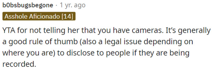 OP is in the wrong for not informing her about the presence of cameras.