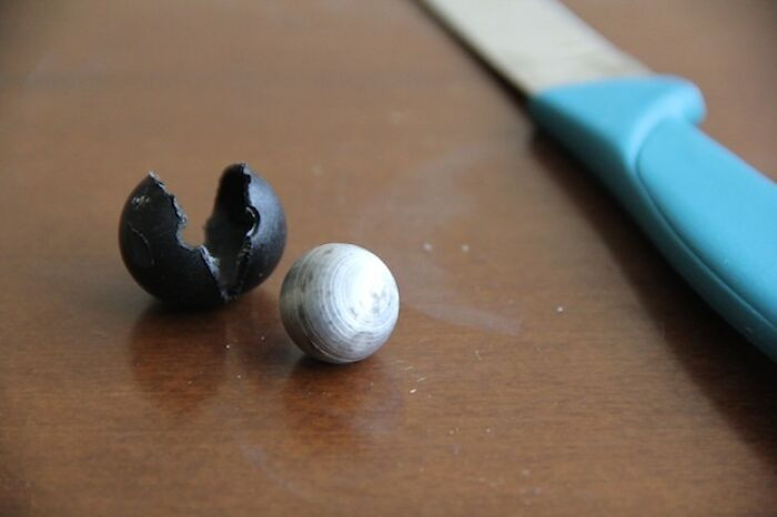 30. A steel core is located within a 'rubber' bullet.
